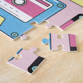 Farbige Kassetten, rosa Hintergrundmuster. Puzzle (Seite)