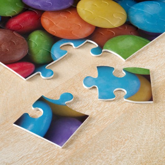 Farbige Knöpfe mit Süßschokolade Puzzle (Seite)