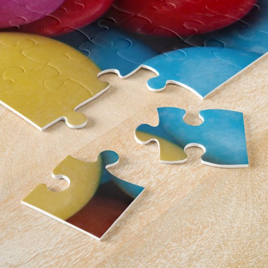 Farbige Knöpfe mit Süßschokolade Puzzle (Seite)