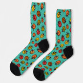 Farbige Marienkäfer auf Türkis Socken (Linkes Detail)