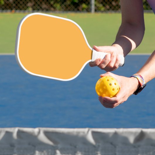 Farbige Orange-Hintergrundtexte für Web und Print Pickleball Schläger (InSitu)