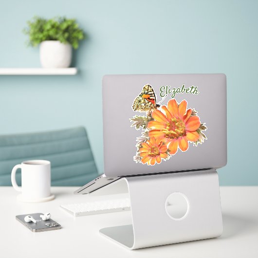Farbige orangefarbene Blume und Schmetterlingstick Aufkleber (Laptop auf Schreibtisch)