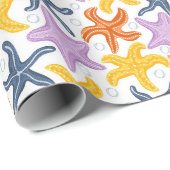 Farbige Seesterne auf Weiß Geschenkpapier (Rolleneckpunkt)