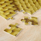 Farbige Stricktextilien, gelbe Textur. Puzzle (Seite)