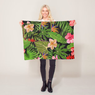 Farbige tropische Blätter und Hibiskusblüten Fleecedecke