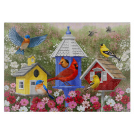 Farbige Vögel und Birthäuser Schneidebrett