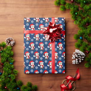 Farbige Weihnachtspinguine und Schneeflockenmuster Geschenkpapier