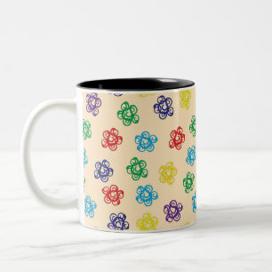 Farbige wirbelnde blumige geometrische Kreise Zweifarbige Tasse