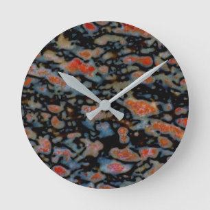 Farbiger versteinerter Dinosaurierknochen Runde Wanduhr