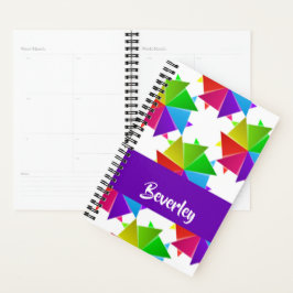 Farbiges gefaltetes Papier auf weiß Planer