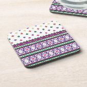 Farbiges geometrisches Folkloredesign mit Blume Getränkeuntersetzer (Linke Seite)