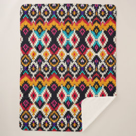 Farbiges Ikat-Inspiriertes geometrisches Muster Sherpadecke