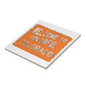 Farbiges orangefarbenes Begrüßungszeichen Fliese (Seite)