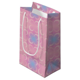 Farbtöne mit rosa, rosa und blauem Hintergrund Kleine Geschenktüte