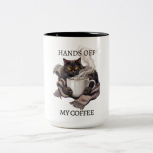Fass meine Kaffeetasse nicht an Lustige müde Katze