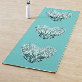Feather heart in soft green yogamatte
