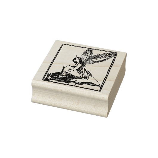 Fee sitzt auf einem Pilz Gummistempel (Stempel)