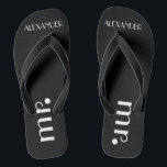 Feierliche Hochzeiten Personalisiert Badesandalen<br><div class="desc">Eine niedliche Ergänzung zu Ihrer Hochzeit am Strand oder am Pool! Schwarze Flip Flops mit dem Wort "Mr." und dem Namen der Zelter sind personalisiert. Um die passenden Brautpaare zu sehen, besuchen Sie bitte mein Geschäft "The Hungarican Princess" unter www.zazzle.com/hungaricanprincess*. Schauen Sie sich meine Abteilung "Flip Flops" an. Herzlichen Glückwunsch!...</div>