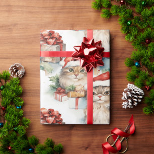 Feierliche Katzen in Weihnachtsmannmützen und Gesc Geschenkpapier