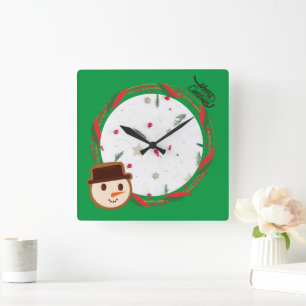 Feierliche Weihnachten im Schneemann Grün Quadratische Wanduhr