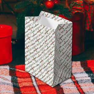 Feierliche Weihnachtstypografie Mittlere Geschenktüte