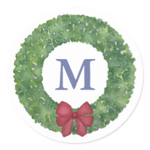 Feierlicher Grünkranz mit rotem Bow