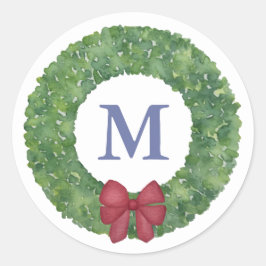 Feierlicher Grünkranz mit rotem Bow Runder Aufkleber