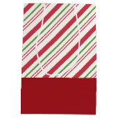 Feierlicher Mops in Roter Weihnachtsmannmütze mit  Mittlere Geschenktüte (Rückseite)