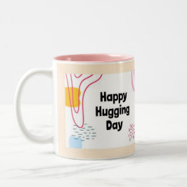 Feiern Sie den Tag des nationalen Umarmens mit ein Zweifarbige Tasse