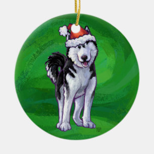 Feiernder Husky in Weihnachtsmannmütze auf Green Keramikornament