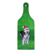 Feiernder Husky in Weihnachtsmannmütze auf Green Schneidebrett (Vorderseite)