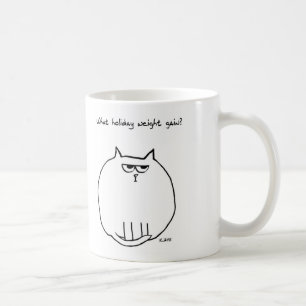 Feiertags-Gewichtszunahme - verärgerte Katze ist Kaffeetasse