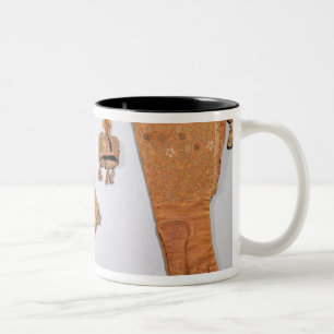 Feilbietendes Set des Beutels, des Handschuhs und Zweifarbige Tasse