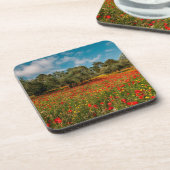 Feld mit Blume und Bäumen Getränkeuntersetzer (Linke Seite)