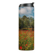 Feld mit Blume und Bäumen Thermosbecher (Nach links gedreht)