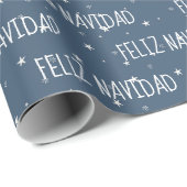 Feliz Navidad mit Sternen auf blau Geschenkpapier (Rolleneckpunkt)