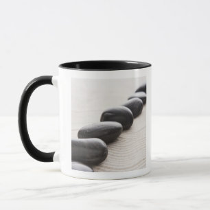 Felsen auf Sand Tasse