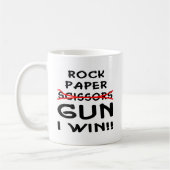 Felsen-Papierschere-Gewehr, das ich gewinne Kaffeetasse (Links)