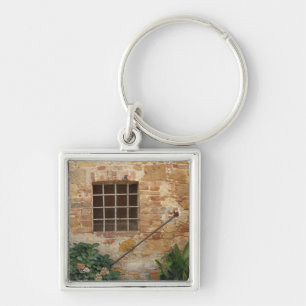 Fenster und alte Steinmauer, Pienza, Italien Schlüsselanhänger