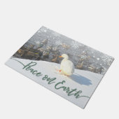 Ferienhaus "Weltfrieden" Fußmatte (Schrägansicht)