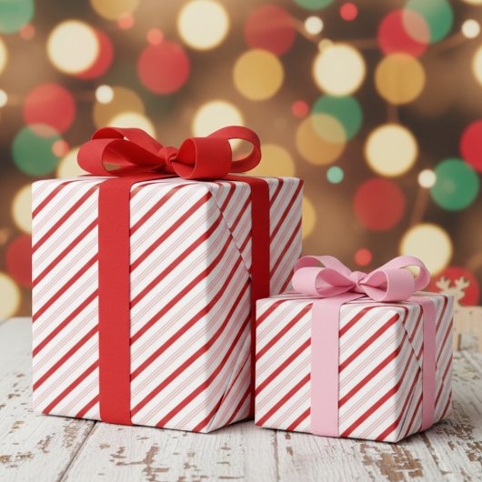 Festive Red and Pink Christmas Candy Cane Stripes Geschenkpapier