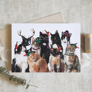 Festliche Aquarellkatzen mit Weihnachtsmannmützen Feiertagskarte
