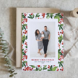 Festliche Grünpflanzen und Winterberry Foto Weihna Feiertagskarte<br><div class="desc">Frohe Weihnachten! Mit unserer individuell gestaltbaren Weihnachtskarte für das Foto können Sie Ihre Wünsche für einen angenehmen Aufenthalt mit einem wunderschönen Aquarell aus roten Winterbeeren und üppiger Vegetation erfüllen. Mit dieser eleganten Weihnachtskarte können Sie Ihr Lieblings-Foto präsentieren und eine persönliche Touch mit Ihrer individuellen Botschaft hinzufügen. Die Weihnachtskarte des Fotos,...</div>