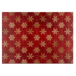 Festliche rote und goldene Folien-Winter-Schneeflo Schneidebrett