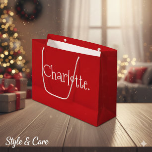 Festliche rote Weihnachtsgeschenktasche mit person Große Geschenktüte
