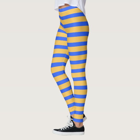 Fett blaues und goldfarbenes, horizontales Streife Leggings (Links)