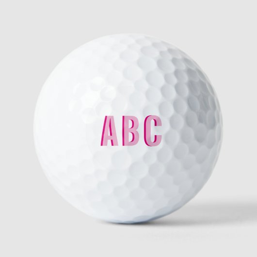 Fettgestrichene Rosa-3-Letter-Monogramm Golfball (Vorderseite)