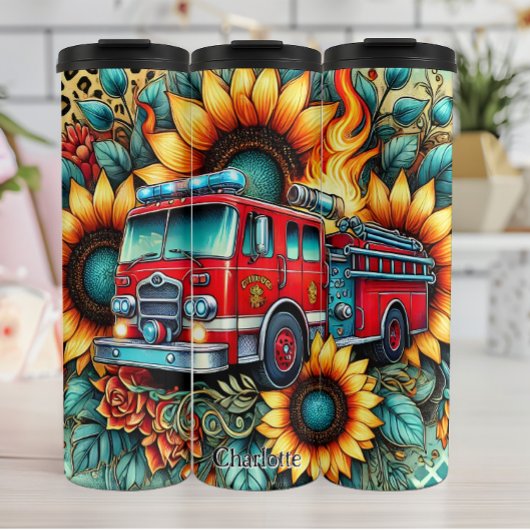 Feuerwehrfahrzeuge inmitten von Sonnenblumen und F Thermosbecher