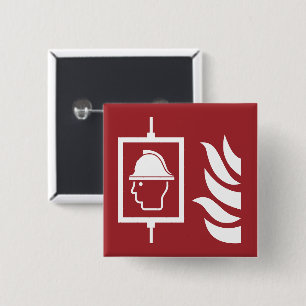 Feuerwehrleute heben Sicherheitszeichen an Button