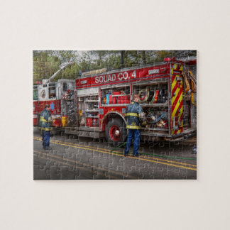 Feuerwehrmänner - das moderne Löschfahrzeug Puzzle